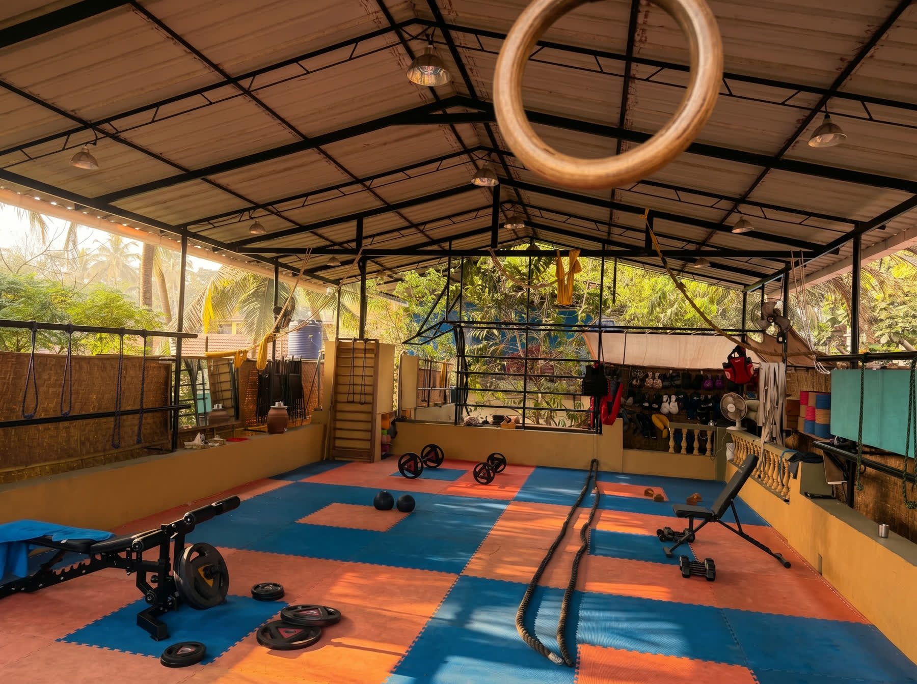 the open-air training floor at vinnies gym, assagao, mats and jungle